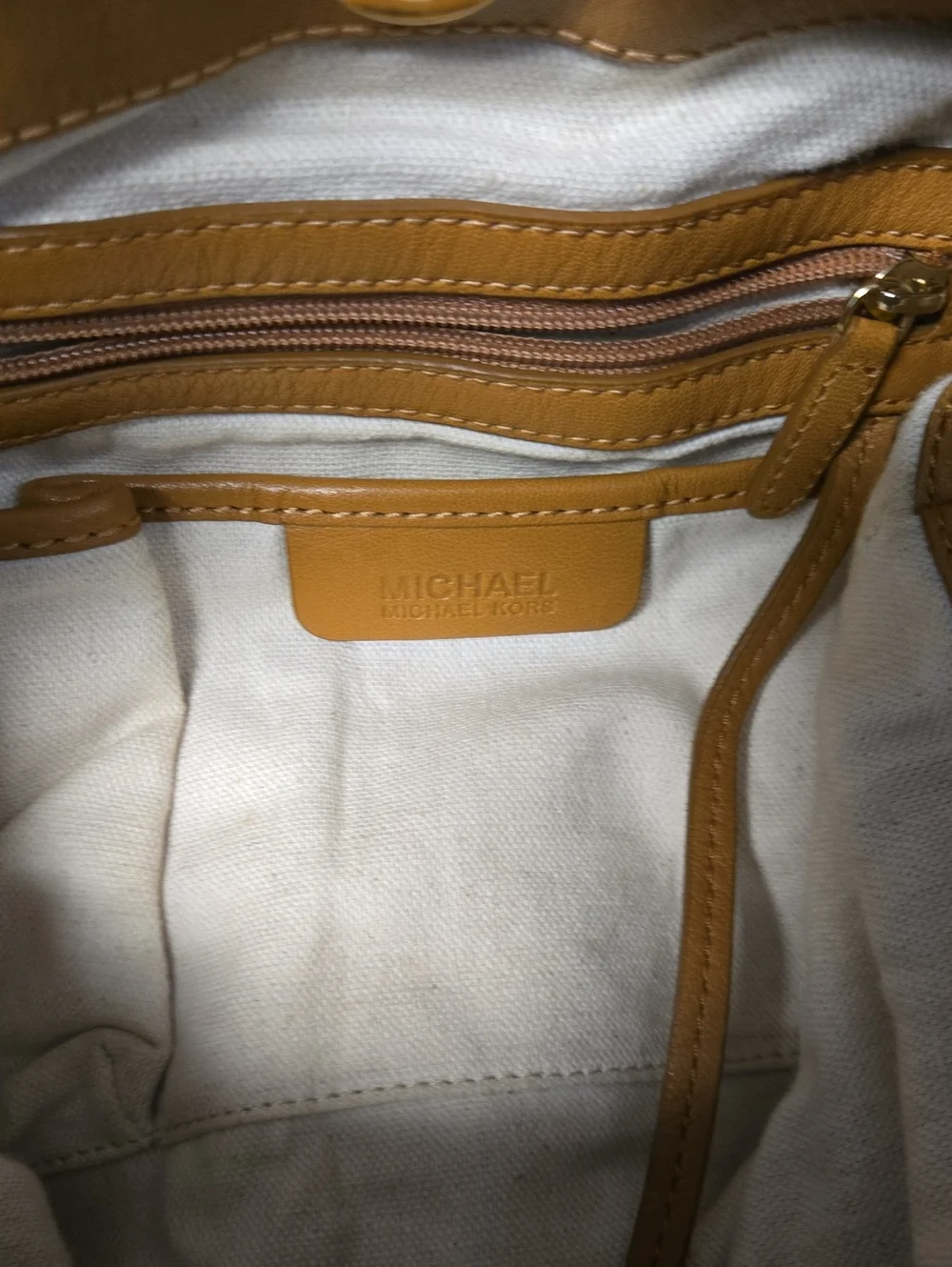 EUC Michael Kors Tan Logo-Embossed Hobo with Gold Studs